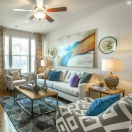 Open space living area with natural lighting